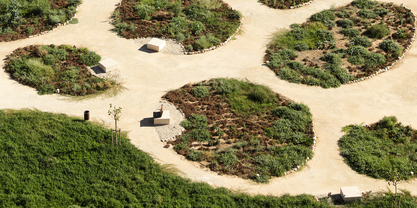 Mediterranean Gardens of La Hoya Park with benches Longo